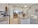Open concept kitchen with granite island and stainless steel appliances at 4743 Nw 39Th Street Rd, Ocala, FL 34482