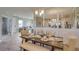 Bright dining room featuring a rustic wooden table and comfortable seating at 4743 Nw 39Th Street Rd, Ocala, FL 34482