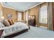 Bright bedroom with large windows and carpeted floor at 17800 Se 237Th Ct, Umatilla, FL 32784