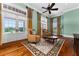 Relaxing sitting area with hardwood floors and French doors at 17800 Se 237Th Ct, Umatilla, FL 32784