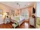 Light and airy bedroom with a four-poster bed at 7819 Se 12Th Cir, Ocala, FL 34480