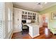 Bright home office features built-in shelving and hardwood floors at 7819 Se 12Th Cir, Ocala, FL 34480