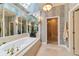 Relaxing bathroom with soaking tub and walk-in shower at 7819 Se 12Th Cir, Ocala, FL 34480