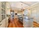 Spacious kitchen with granite island, custom cabinetry, and high-end appliances at 7819 Se 12Th Cir, Ocala, FL 34480
