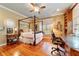 Spacious bedroom with a built-in desk and hardwood floors at 7819 Se 12Th Cir, Ocala, FL 34480