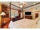 Bedroom with built-in shelving and hardwood floors at 7819 Se 12Th Cir, Ocala, FL 34480