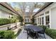 Outdoor patio with a fountain and seating at 7819 Se 12Th Cir, Ocala, FL 34480