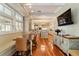 Charming breakfast nook with built-in bench seating and view to kitchen at 7819 Se 12Th Cir, Ocala, FL 34480