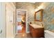 Elegant bathroom with marble vanity and a walk-in shower at 7819 Se 12Th Cir, Ocala, FL 34480