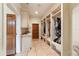 Spacious mudroom with built-in lockers and cabinets at 7819 Se 12Th Cir, Ocala, FL 34480