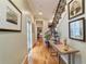 Bright hallway with hardwood floors and access to bedrooms at 7819 Se 12Th Cir, Ocala, FL 34480
