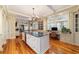 Gourmet kitchen featuring a large island, custom cabinetry, and ample counter space at 7819 Se 12Th Cir, Ocala, FL 34480