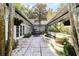 Lovely courtyard with fountain and seating area at 7819 Se 12Th Cir, Ocala, FL 34480