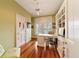 Home office with hardwood floors and built-in shelves at 7819 Se 12Th Cir, Ocala, FL 34480