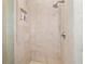 Clean shower with beige tile and built-in shelving at 7819 Se 12Th Cir, Ocala, FL 34480