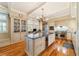 Bright kitchen boasts granite countertops, custom cabinetry, and stainless steel appliances at 7819 Se 12Th Cir, Ocala, FL 34480