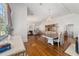 Spacious living room features hardwood floors, fireplace, and ample natural light at 1218 Se 11Th St, Ocala, FL 34471