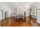 Formal dining room with hardwood floors, chandelier, and a large table at 1218 Se 11Th St, Ocala, FL 34471