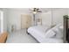 Bright bedroom with a queen bed, white linens and large closet at 1218 Se 11Th St, Ocala, FL 34471