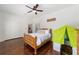 Cozy bedroom featuring wood floors, and built in closet at 1218 Se 11Th St, Ocala, FL 34471
