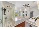 Elegant bathroom with soaking tub, walk-in shower, and double vanity at 1218 Se 11Th St, Ocala, FL 34471