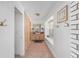 Bathroom with light pink tile floors, double vanity, and shower at 1218 Se 11Th St, Ocala, FL 34471
