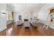 Elegant living room with hardwood floors, two sofas, and a fireplace at 1218 Se 11Th St, Ocala, FL 34471