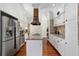 Modern kitchen with granite countertops, white cabinets, and stainless steel appliances at 1218 Se 11Th St, Ocala, FL 34471