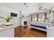 Large bedroom with hardwood floors, fireplace, and ample natural light at 1218 Se 11Th St, Ocala, FL 34471