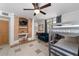 Bedroom with gray bunk beds, a small sofa, and tiled flooring at 1218 Se 11Th St, Ocala, FL 34471
