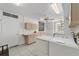 Clean laundry room with washer, dryer, cabinets, and countertop at 1218 Se 11Th St, Ocala, FL 34471