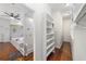 Spacious walk-in closet with ample shelving and hanging space at 1218 Se 11Th St, Ocala, FL 34471
