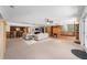 Open living room with tiled floors and access to the backyard at 1218 Se 11Th St, Ocala, FL 34471