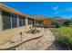Stone paved patio with dolphin fountain and lighting at 13166 Se 86Th Cir, Summerfield, FL 34491