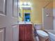 Bathroom with toilet, bathtub, vanity, and tiled floor at 13166 Se 86Th Cir, Summerfield, FL 34491