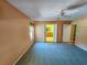 Bright bedroom with carpet, ceiling fan, and access to bathroom at 13166 Se 86Th Cir, Summerfield, FL 34491