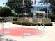 Veterans memorial with engraved names and flag poles at 13166 Se 86Th Cir, Summerfield, FL 34491
