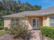 House exterior featuring a front door and walkway at 13166 Se 86Th Cir, Summerfield, FL 34491