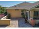 Relaxing backyard patio with brick pavers and potted plants at 13166 Se 86Th Cir, Summerfield, FL 34491
