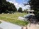 Shuffleboard courts with covered seating area nearby at 13166 Se 86Th Cir, Summerfield, FL 34491