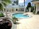 Community spa with lush landscaping at 13166 Se 86Th Cir, Summerfield, FL 34491