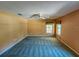 Spacious bedroom with carpet, ceiling fan and window with garden view at 13166 Se 86Th Cir, Summerfield, FL 34491