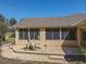 Lovely stone patio with a captivating dolphin fountain and lighting at 13166 Se 86Th Cir, Summerfield, FL 34491