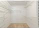 Large walk-in closet with wire shelving at 8620 Sw 94Th St # G, Ocala, FL 34481