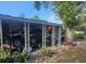 Covered carport with attached storage and recreational vehicle parking at 34828 1St Ave, Leesburg, FL 34788