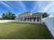 Large backyard with a screened enclosure at 3403 Gatlin Place Cir, Orlando, FL 32812