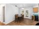 Dining area with wood table and chairs, access to back patio at 2810 Se 8Th St, Ocala, FL 34471