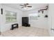 Well-lit bedroom with tiled floors, and plenty of space at 2810 Se 8Th St, Ocala, FL 34471