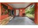 Covered carport area with storage and access to the house at 2810 Se 8Th St, Ocala, FL 34471