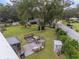 Large backyard with deck, seating area, shed, and fire pit at 2810 Se 8Th St, Ocala, FL 34471